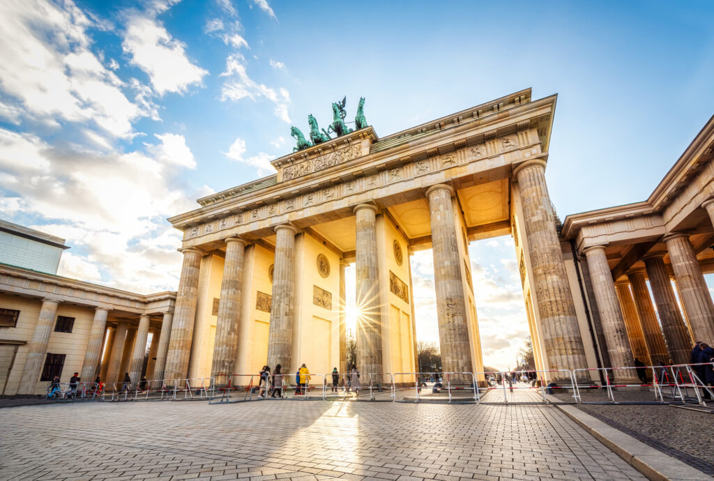 Brandenburg gate at sunset with solar flare, Berlin